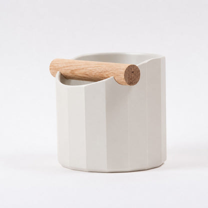 The Facet Geometric Espresso Knock Box with Oak Knock Bar